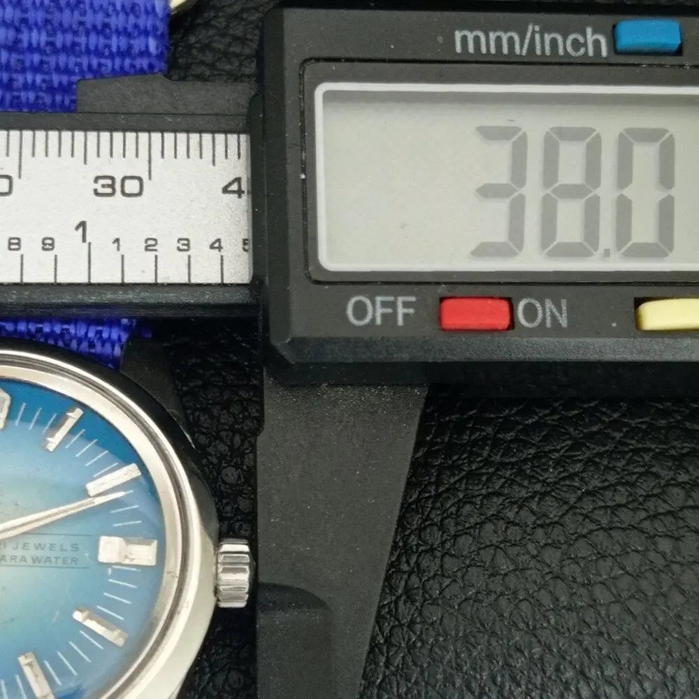 Vintage 1981 Citizen Manual Wound Mens Silver Watch & Blue accents